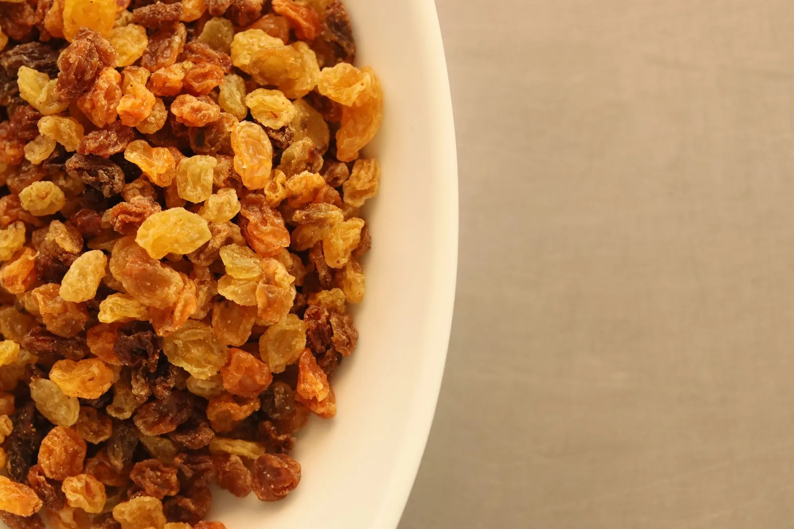 Bowl of raisins and dried grapes