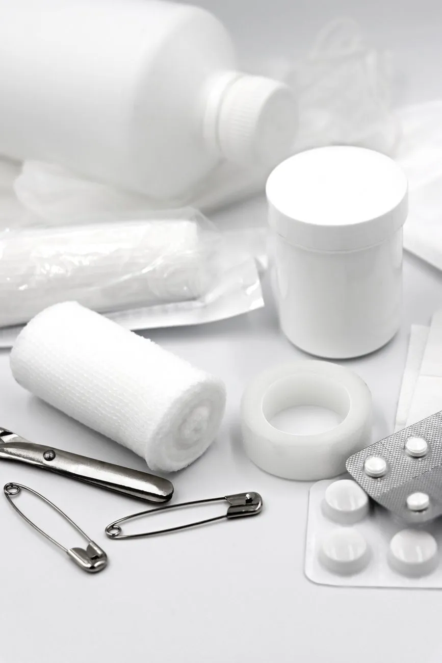 Styptic powder and towel ready beside dog grooming supplies