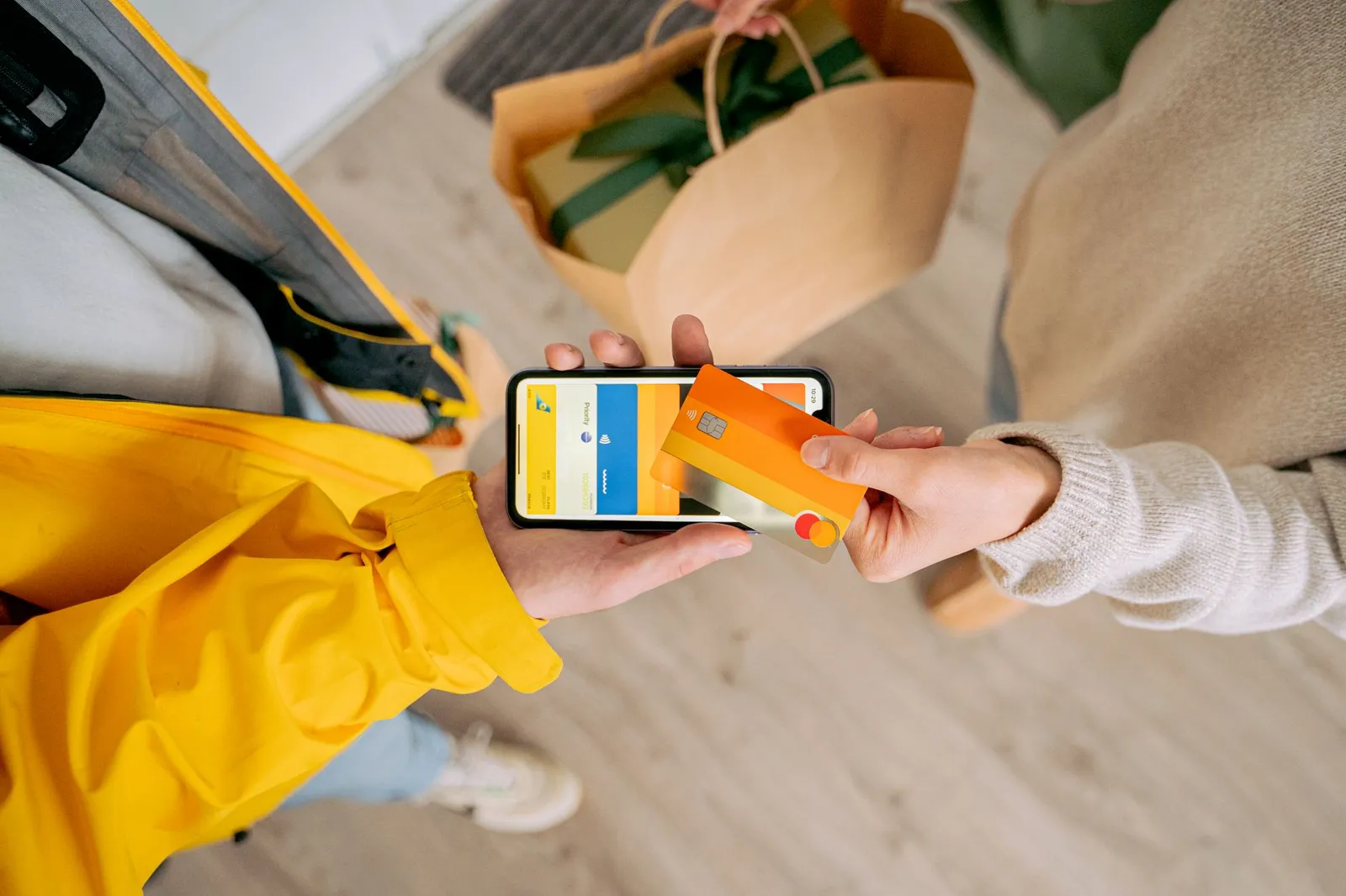 Person reviewing service pricing on a phone before booking pet grooming
